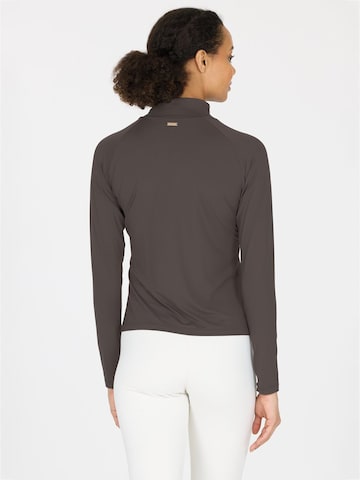 Athlecia Functioneel shirt 'Grina' in Bruin