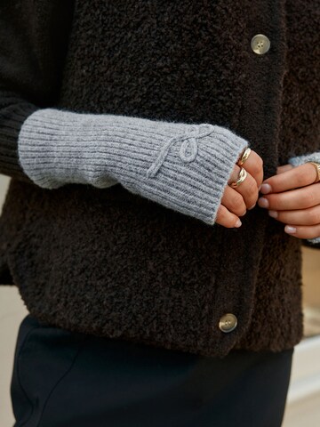 Next Stulpen in Grau