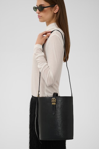 SOAKED IN LUXURY Skuldertaske 'Navarro ' i sort: forside