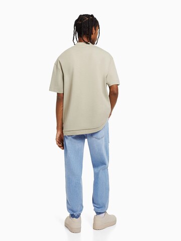 Bershka Tapered Jeans in Blau