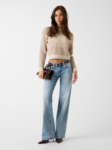 GUESS - Jersey en beige