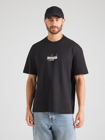 Tricou de la GUESS pe negru: față