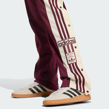 ADIDAS ORIGINALS Loose fit Trousers 'Adibreak' in Red