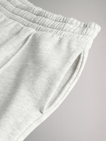 The Set Szeroka nogawka Spodnie w kolorze szary