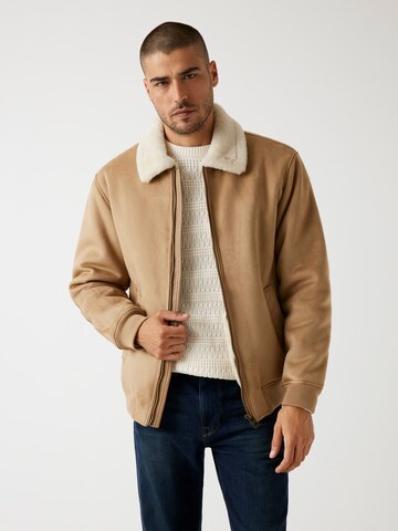 GUESS Between-Season Jacket in Brown: front