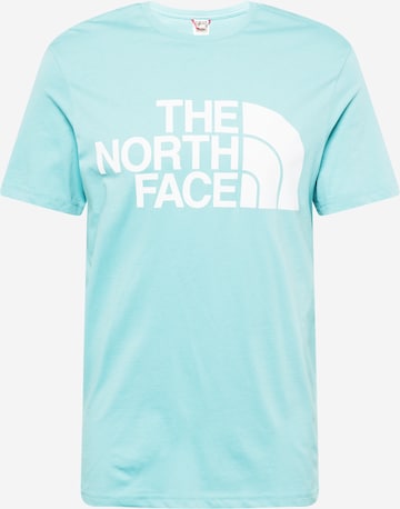 THE NORTH FACE T-shirt i blå: framsida