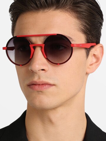Occhiali da sole 'PLD 6016/S' di Polaroid in rosso