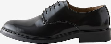 Chaussure à lacets Next en noir : devant