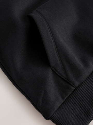 Next Jogginganzug in Schwarz