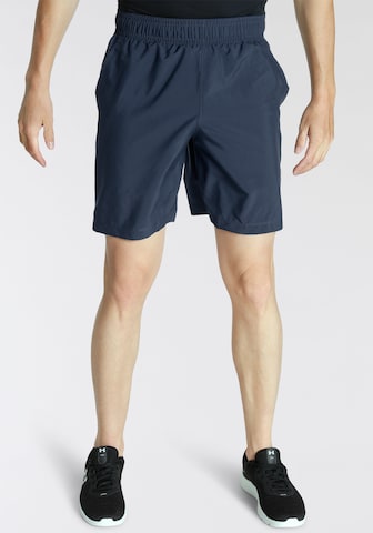 Regular Pantalon de sport UNDER ARMOUR en bleu : devant