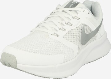 NIKE Running Shoes in White: front