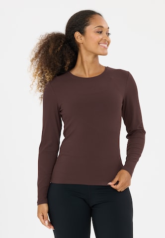 Athlecia Performance shirt 'Tinashe V2' in Brown: front