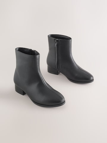 Bottes Next en noir