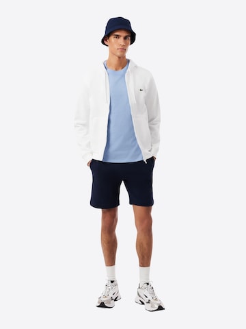 Maglietta di LACOSTE in blu