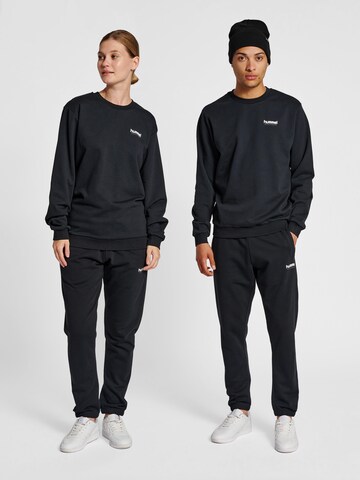 Hummel Sportsweatshirt 'Austin' in Zwart