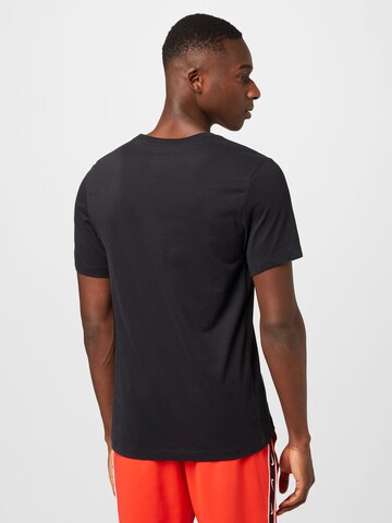 T-Shirt fonctionnel 'Wild Card' NIKE en noir