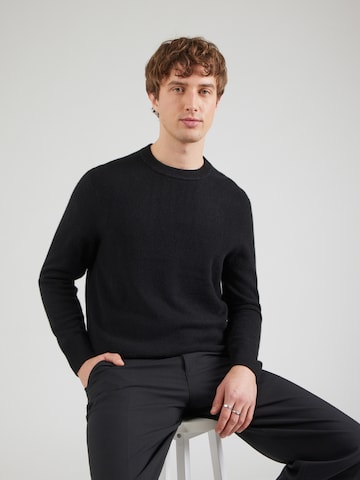 Pull-over Calvin Klein en noir : devant