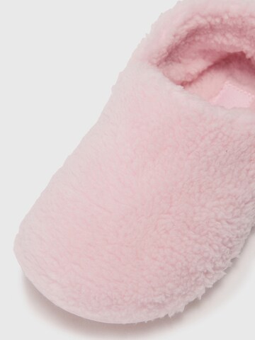 Pantoufle 'Classic Cozzzy' Crocs en rose