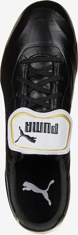 Chaussure de foot 'King Top FG' PUMA en noir