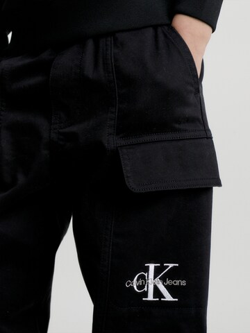 Calvin Klein Jeans Tapered Hose in Schwarz