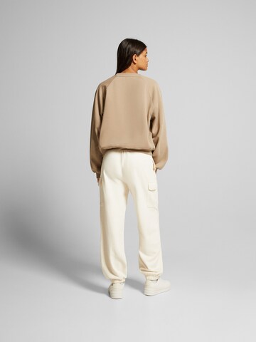 Bershka Tapered Hose in Gelb