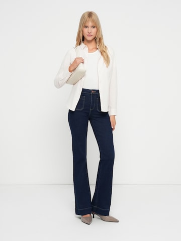 WRANGLER Flared Jeans 'COSMIT_CORRAL' in Blauw