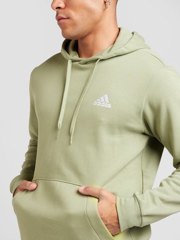 ADIDAS SPORTSWEAR Sports sweatshirt 'FEELCOZY' in Green