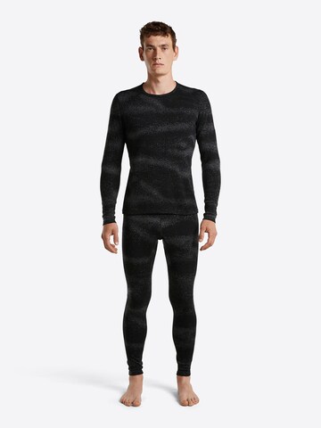 ICEBREAKER - Skinny Pantalón 'Oasis' en negro