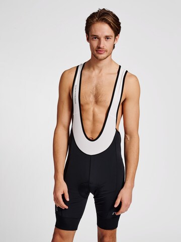 Newline Skinny Sports trousers in Black: front