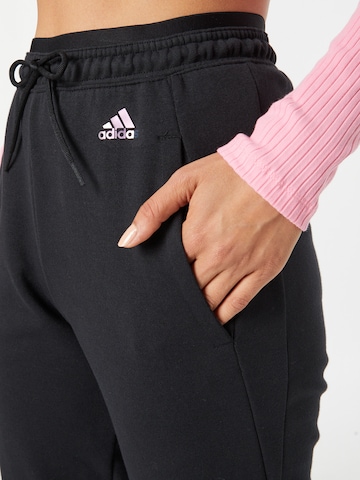 ADIDAS SPORTSWEAR Regular Urheiluhousut 'Aopsuit' värissä musta