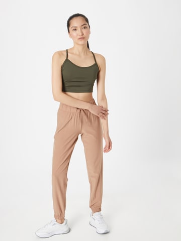 Athlecia Tapered Workout Pants 'Austberg' in Brown