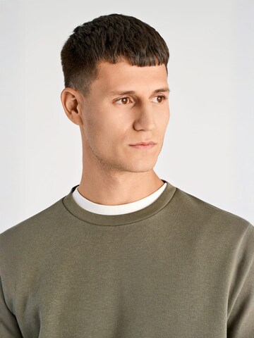 Junk de Luxe Sweatshirt in Green