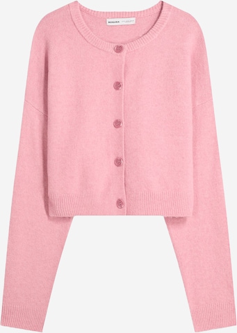 Geacă tricotată de la Bershka pe roz: față