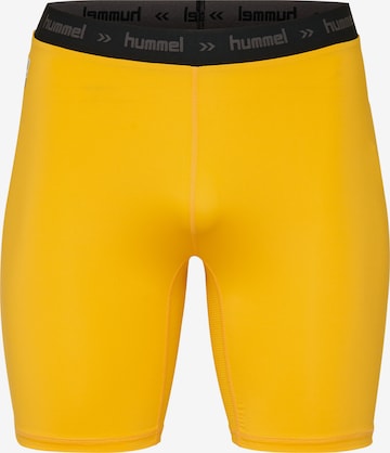 Hummel - Skinny Pantalón deportivo en amarillo: frente