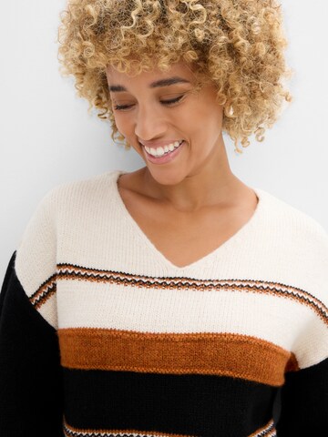 bonprix Sweter w kolorze beżowy