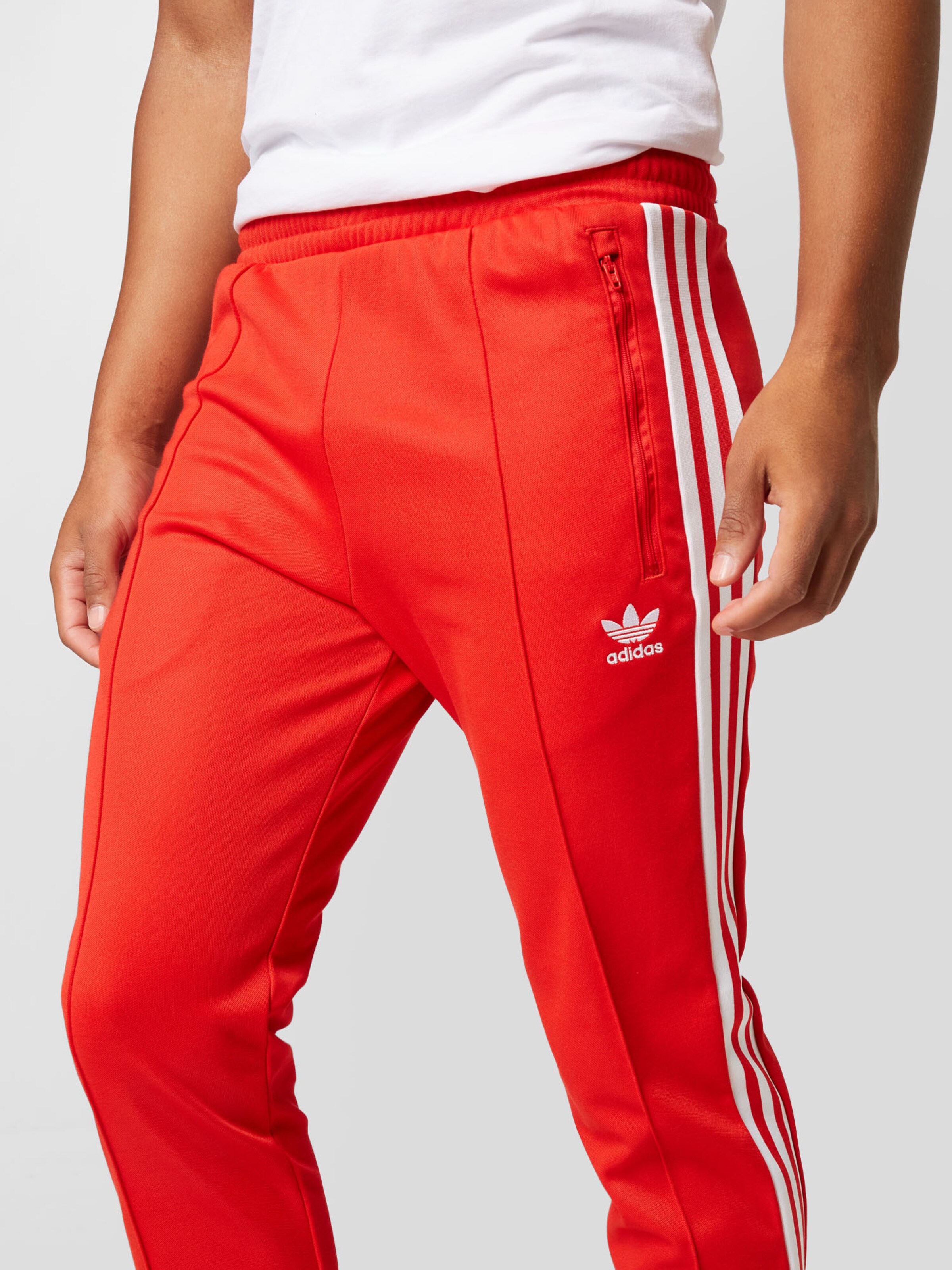ADIDAS ORIGINALS Broek 'Beckenbauer' in Rood | ABOUT YOU