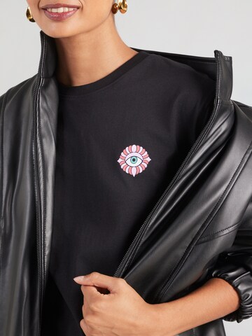 Kaotiko Póló 'FOUND IN PARADISE' - fekete