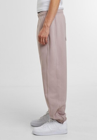 Tapered Pantaloni di Urban Classics in rosa