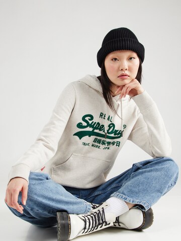 Sweat-shirt Superdry en beige : devant