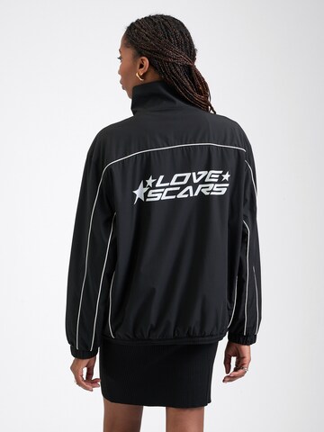 Love Scars Jacke in Schwarz: Vorderseite