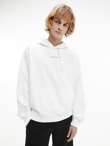 Sweat-shirt Calvin Klein Jeans en blanc : devant