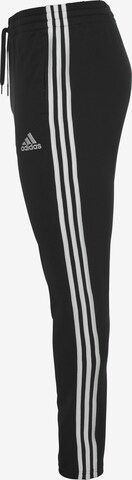 ADIDAS SPORTSWEAR Tapered Παντελόνι φόρμας 'Essentials' σε μαύρο