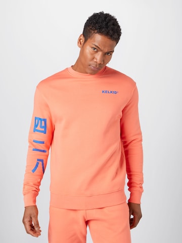 ABOUT YOU x MeroSweater majica 'Kelkid' - narančasta boja: prednji dio