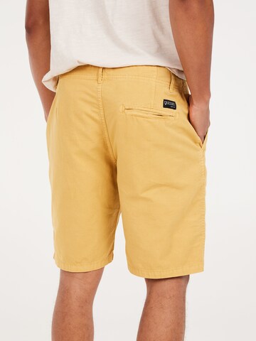 PROTEST Regular Hose 'PRTCOMIE' in Gelb