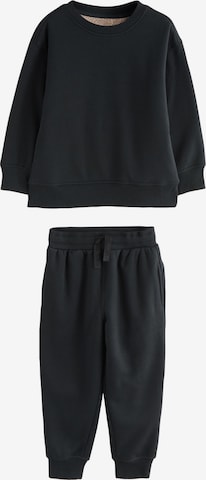 juoda Next Miego kostiumas: priekis