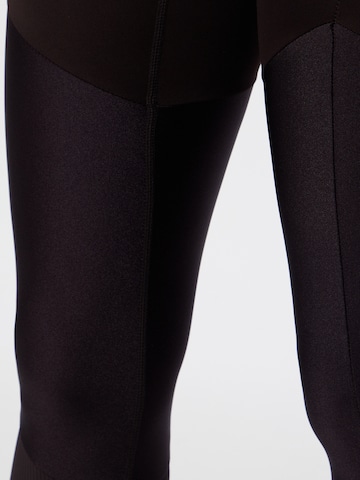 Athlecia Skinny Spodnie sportowe 'Kachel' w kolorze czarny