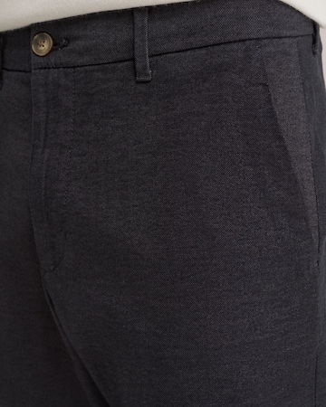 WE Fashion - Slimfit Calças chino em azul