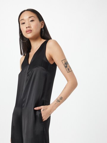 Tuta jumpsuit di Warehouse in nero