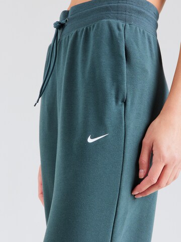 NIKE Alt kitsenev Spordipüksid 'One', värv roheline