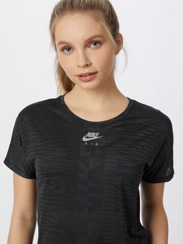 NIKE - Camiseta funcional en negro